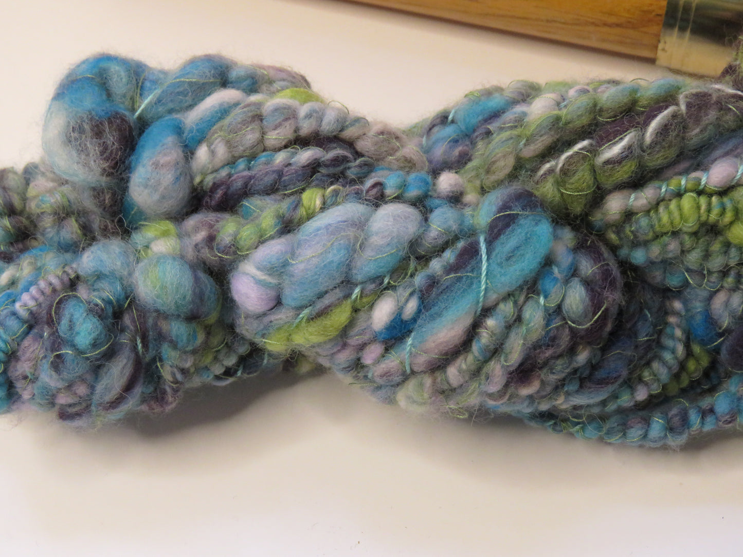 Yarn Y313 Hand Spun Art Yarn, merino wool coil spun with auto-wrapped thread