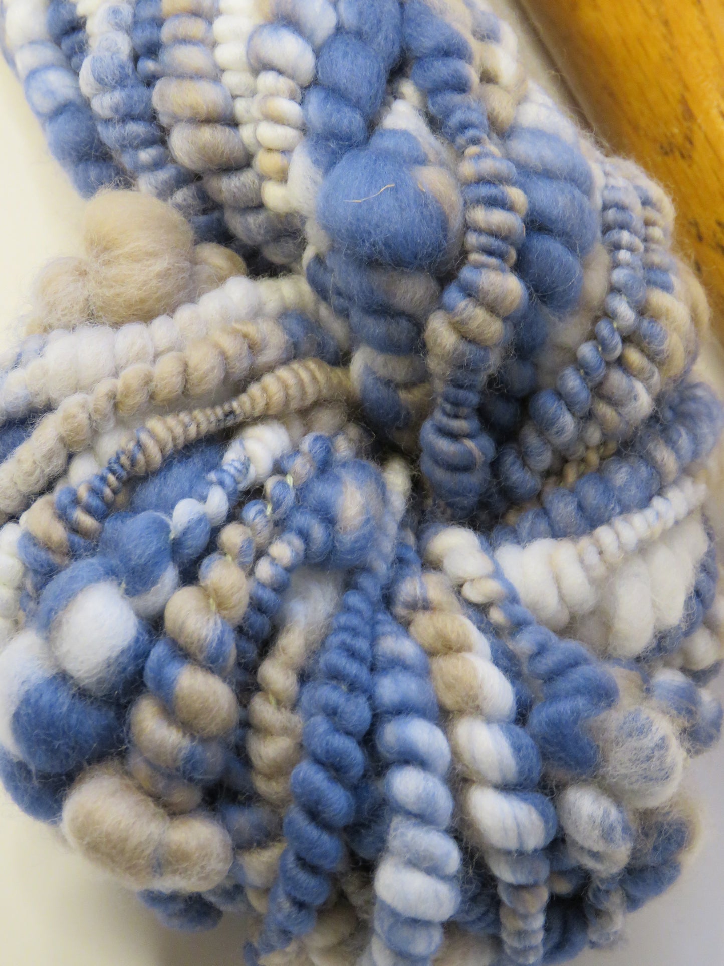 Yarn Y23101 Hand Spun Art Yarn, Core spun coils, merino wool on cotton core